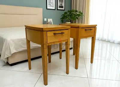 White Nightstands with Intricate Carvings