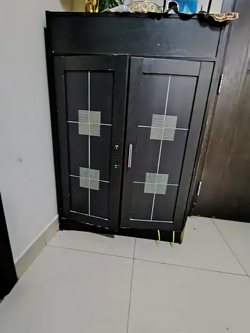 2-door dark wooden storage cabinet - used