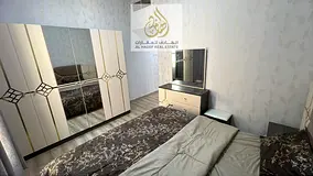 For sale: a luxurious two-bedroom apartment with a spacious living room located in Al Hamidiya, with