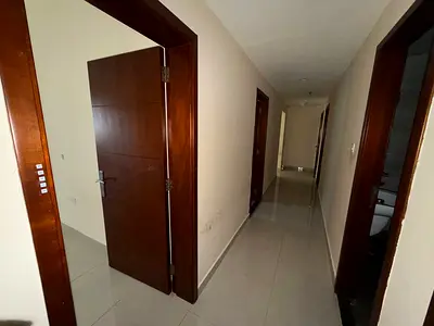 One-bedroom apartment with a spacious living room and maid's room. Located in Al Jurf 2, near the courthouse and Ajman University. Features include ce