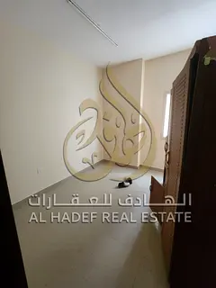 Two-bedroom family apartment with a closed hall in Al Butinah – spacious, modern finishing, prime 