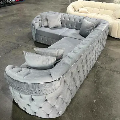 Selling my light grey velvet tufted L-shaped Chesterfield 5- Seater sofa