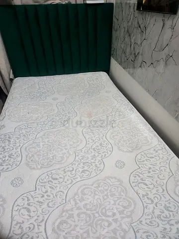 Elegant green Bed frame with Intricate Design