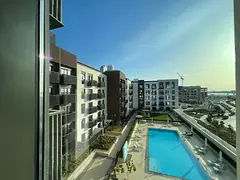 Beautiful 1-bedroom apartment in Maryam Island with a balcony overlooking the pool. Free parking, 1