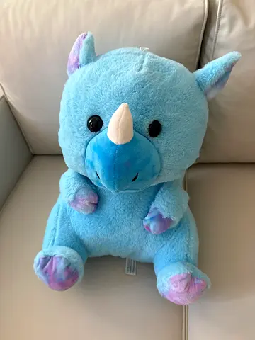 Blue rhino stuffed plush toy — gently used