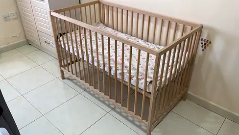IKEA Wooden baby crib with mattress - good condition