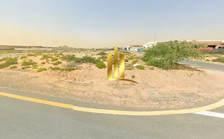 أرض صناعية زاوية تملك حر بموقع مميز للبيع في منطقة الصجعة الصناعية بالشارقة بالقرب من الواحة
