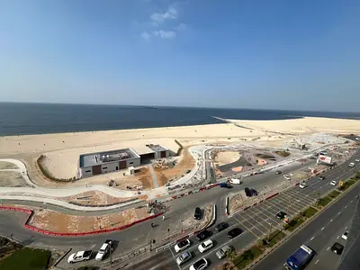 Three bedrooms and a living room # Central air conditioning # Free maintenance # Corniche # Ajman