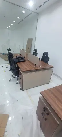 My four -person walnut workstation desk with divider and storage