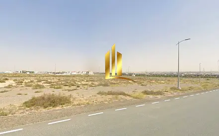 قطعة أرض تجارية زاوية بموقع مميز للبيع في مدينة تلال الشارقة
