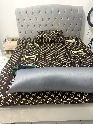 A cozy queen size bed with mattress and side table only in 900 AED