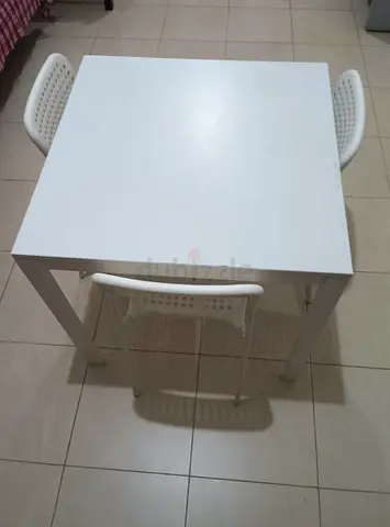 Ikea White Dining Table with three Chairs