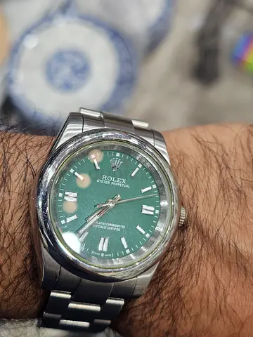 Rolex oyester perpetual green for sale