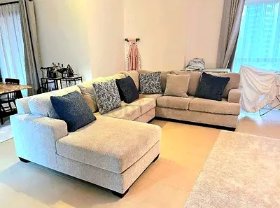 My beige L-shaped sectional sofa with chaise - 6 Seater