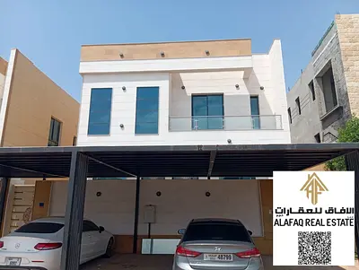 Villa for rent in Al Yasmeen, five bedrooms, living room and hall, maid’s room, seven bathrooms, prime location at AED 110,000 annually