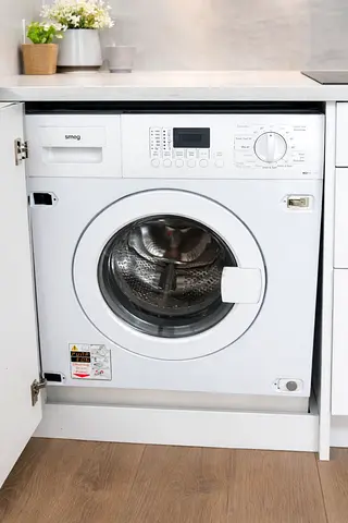 SMEG Built-in Front Load Washing Machine 7 kg washer 4 kg dryer combines  (Integrated) -