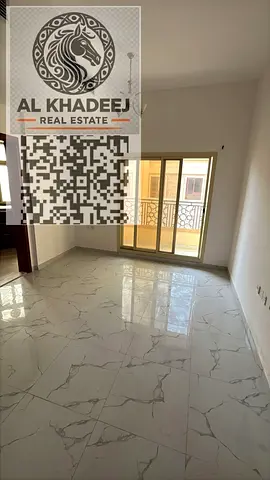 A spacious one-bedroom apartment with a balcony offering an open view, located in the Al-Aliya area, close to all services and main roads.