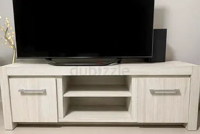 Light wood TV stand with cabinets and open shelves -good condition (doesn’t come with anything else)