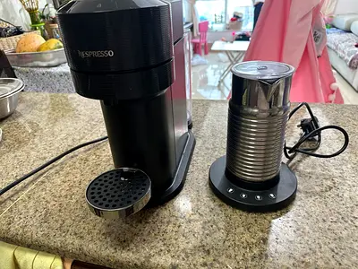 Nespresso Coffee Machine with Milk Frother original price 1500 AED