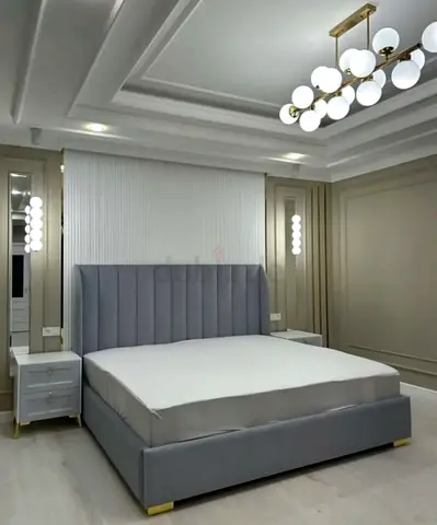 New Grey upholstered bed with tall channel headboard