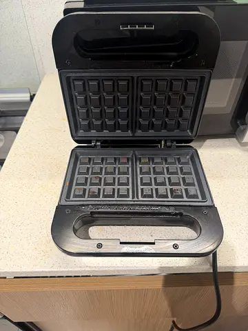 Used waffle maker with non-stick plates
