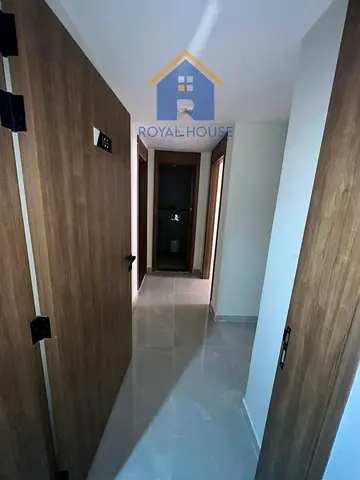 One bedroom and living room in Muwailih, first occupancy building