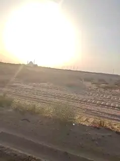 Commercial land for sale in Sharjah, Rawdat Al Qurt area, Al Ruwaidat suburb.