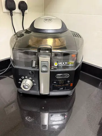 DeLonghi MultiFry Multi Cooker / Air Fryer - brand new condition. Comes with two inserts