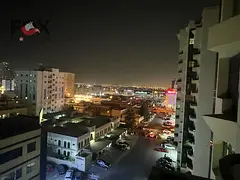 1-bedroom apartment for sale in Rashidiya Towers, balcony, nice view, 1115 sq ft, prime central loca