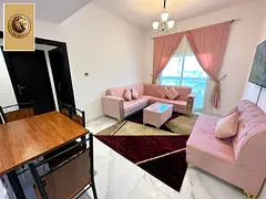 One-bedroom apartment with a hall for monthly rent in Al Rashidiya 3 - Ajman | Newly furnished and a