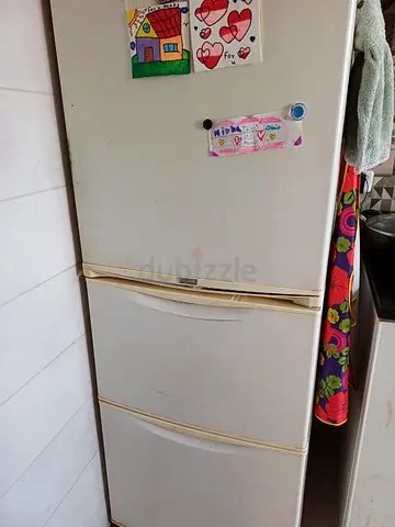 My used white 3-door refrigerator/freezer – working, some cosmetic wear