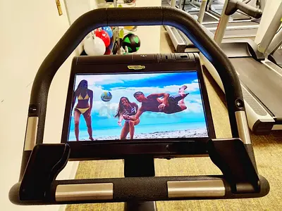 TECHNOGYM EXCITE UNITY 1000 UPRIGHT BIKE