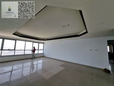 غرفتين وصالة للإيجار السنوي في **برج الكورنيش** بإطلالة جزئية ومنظر جانبي خلاب، بمساحات ممتازة وتصميم مريح يناسب العائلات.