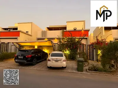 Ready-to-move-in villa with air conditioning, water, and electricity in Al Yasmin, directly behind the mosque.