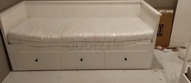 IKEA Hamnes day bed with 3 big storage drawers underneath and with 2 IKEA mattresses is available in