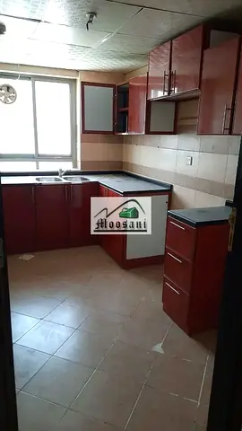 شقة واسعة مكونة من غرفة نوم واحدة وحمامين وشرفة (إطلالة مفتوحة) متاحة للإيجار في برج موساني، عجمان.