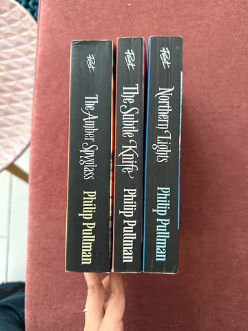 My His Dark Materials trilogy by Philip Pullman