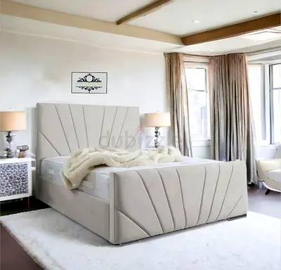 Brand new beige upholstered bed with modern padded headboard