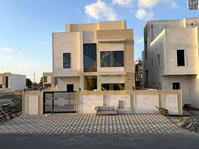 Villa for sale in Al Helio – Ajman | 5 master bedrooms | Central air conditioning | Includes registration and ownership fees | Freehold