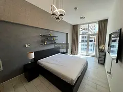 Furnished 1BR Apartment | Chaimaa Premiere JVC | Balcony &amp; Downtown View