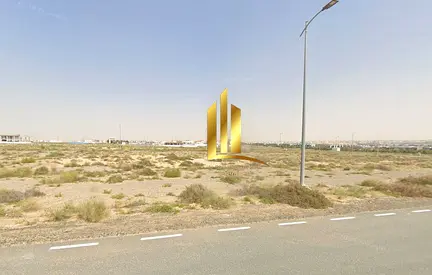 قطعة أرض تجارية زاوية بموقع مميز للبيع في مدينة تلال الشارقة