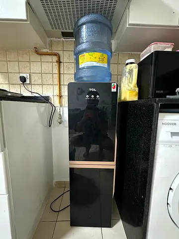 Used once TCL standing water cooler dispenser with cooling cabinet as well
