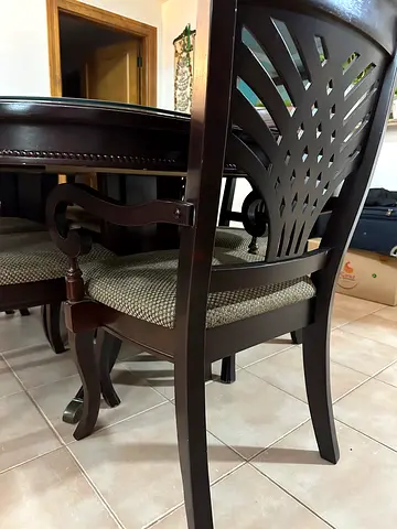 Dark wood 8 seater  dining table with chairs having cushioned seat