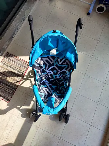Lightweight turquoise umbrella stroller - used, good condition (free delivery within dso)