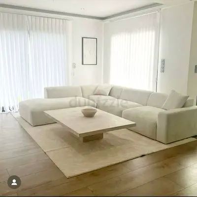 Cream L-shaped sectional sofa