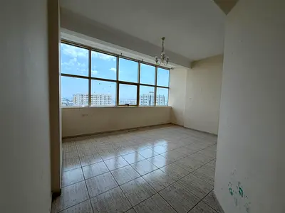 "Spacious 1BR + living, open view | AC on owner | Free maintenance | 6 installments | Family tower | Near Dubai exit | Central gas"