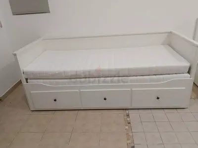 IKEA Hamnes day bed with 3 big storage drawers underneath and with 2 IKEA mattresses is available in