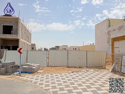 Two townhouse plots with a building permit, second plot from the commercial street in Al Zahya area.
