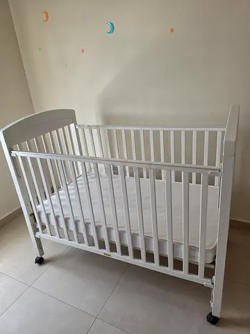 Babyshop Juniors white Wooden Baby Crib on Wheels - Gently Used