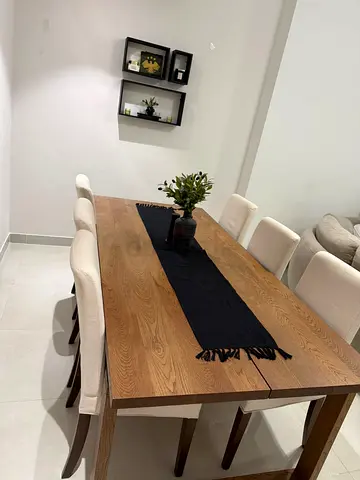 IKEA Solid wood dining table with 8 upholstered chairs - gently used